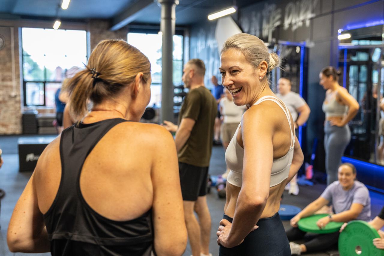 Members chatting together after a session at Relentless Gym